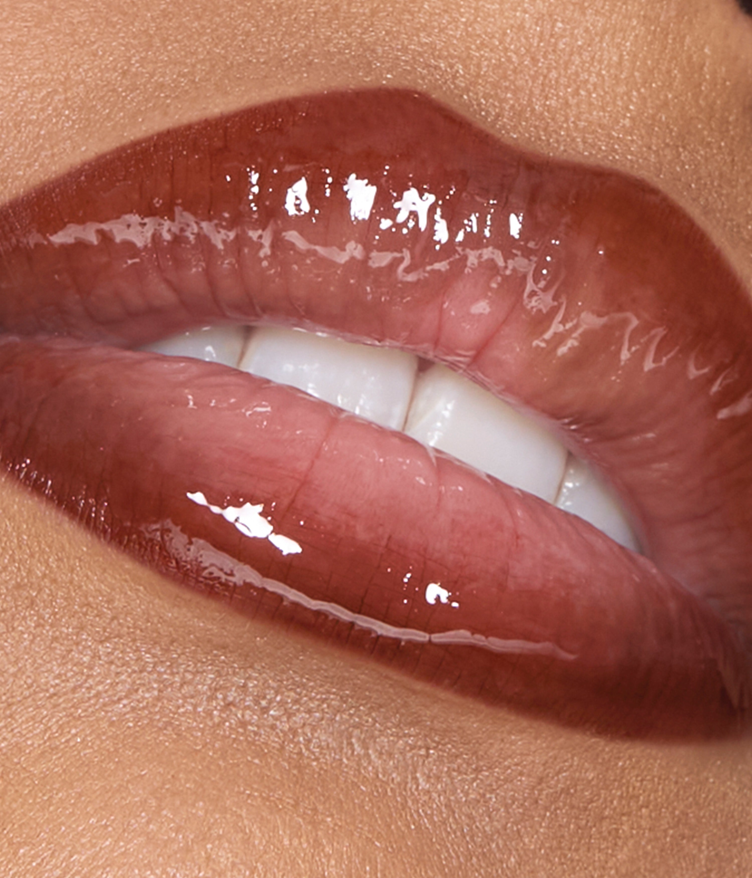huda-beauty-makeout-sesh-lip-duo-peachy-nudes image 2